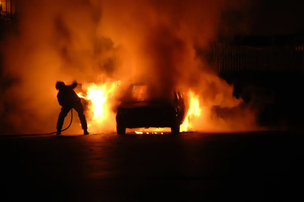 Fire-Fighter-In-Car-Blaze-