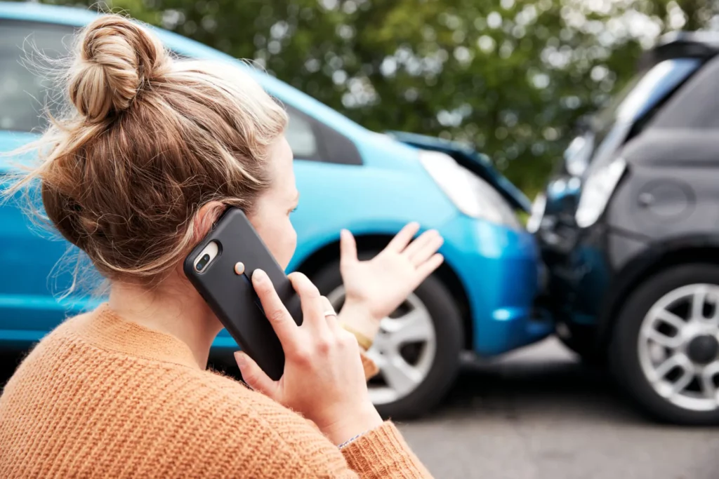 female-motorist-involved-in-car-accident-calling