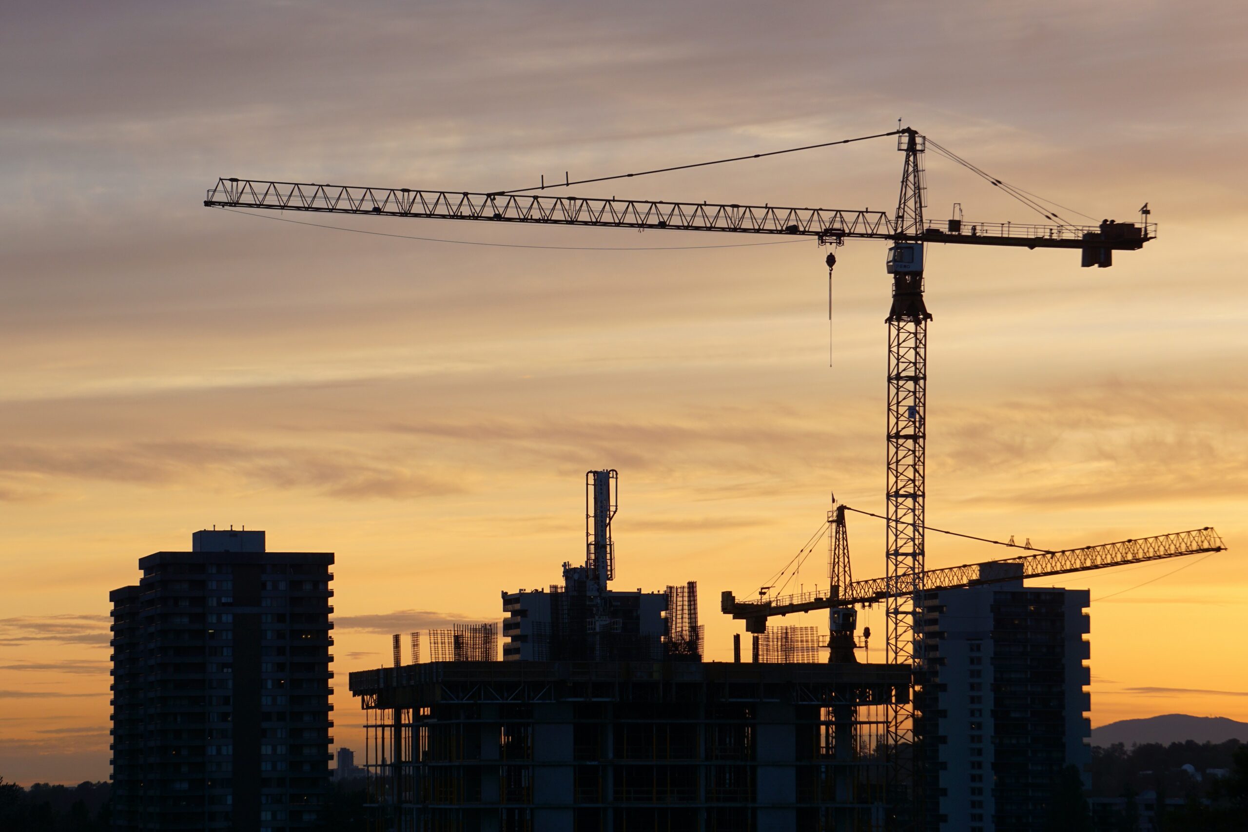 A faraway shot of a construction crane