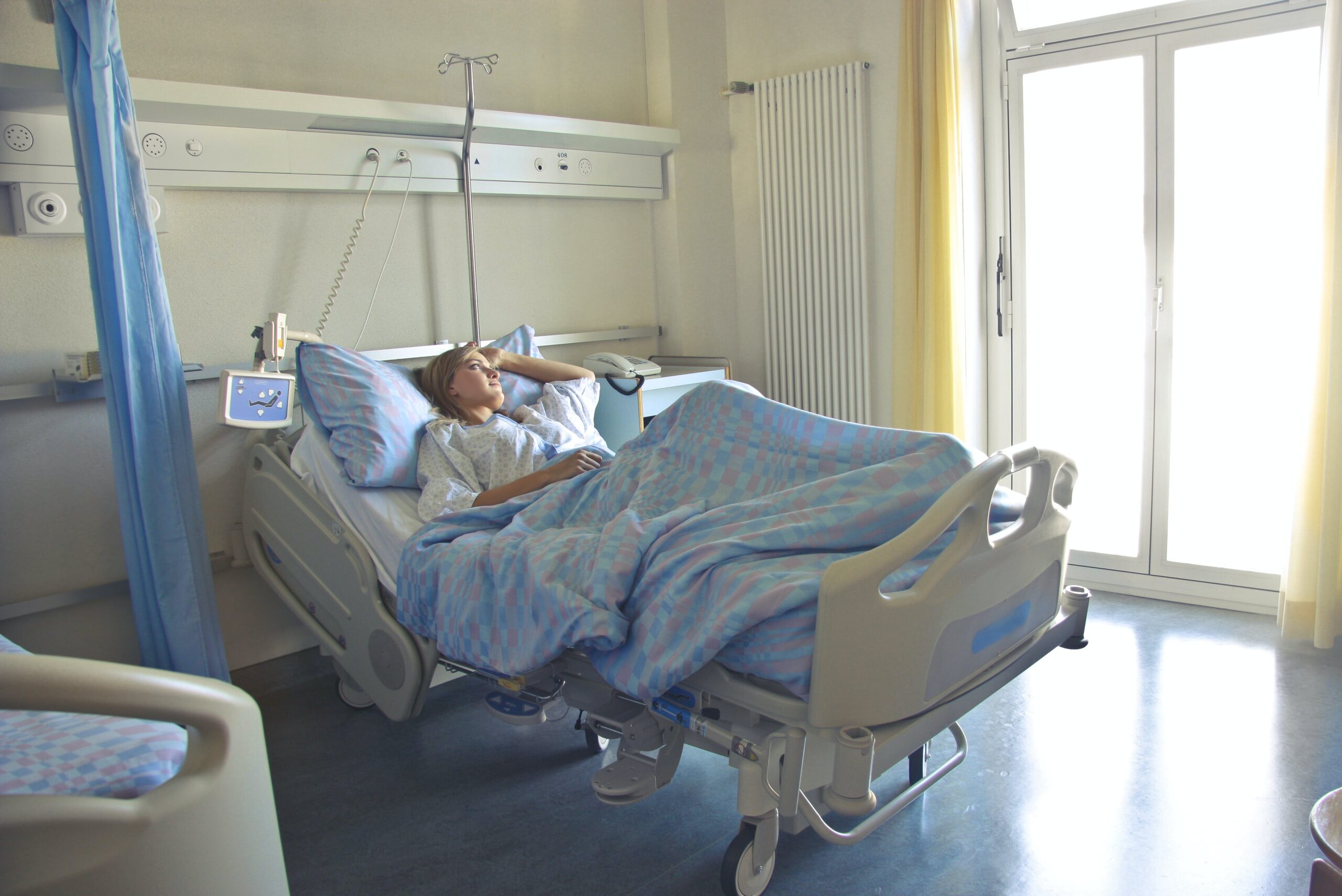 Woman lying in a hospital bed